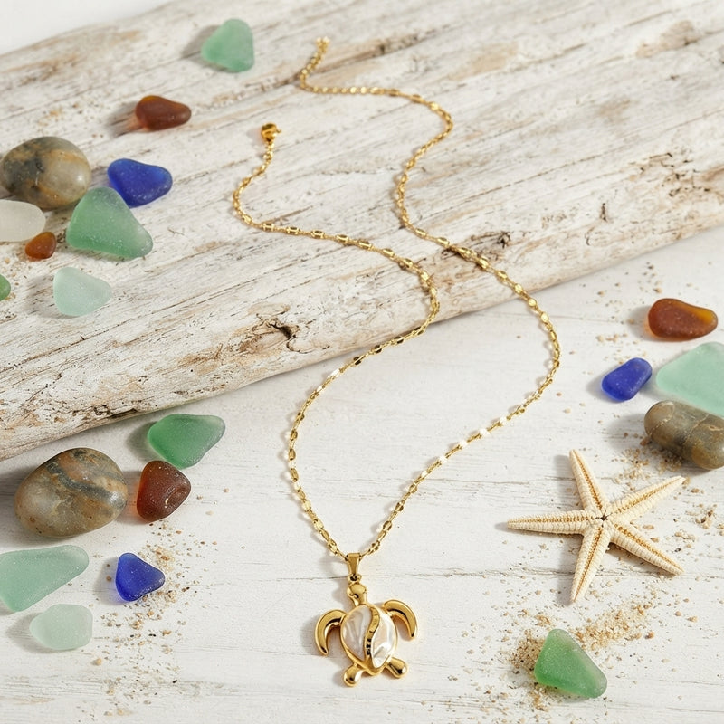 Gold and white enamel sea turtle necklace