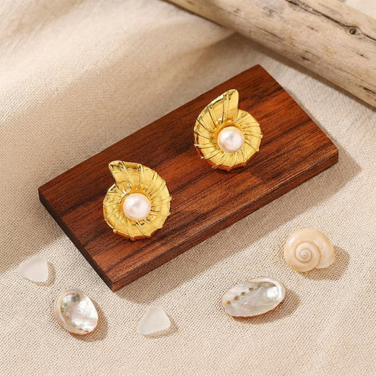Gold and pearl spiral seashell stud earrings