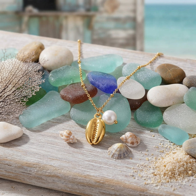 Gold shell and faux pearl pendant necklace